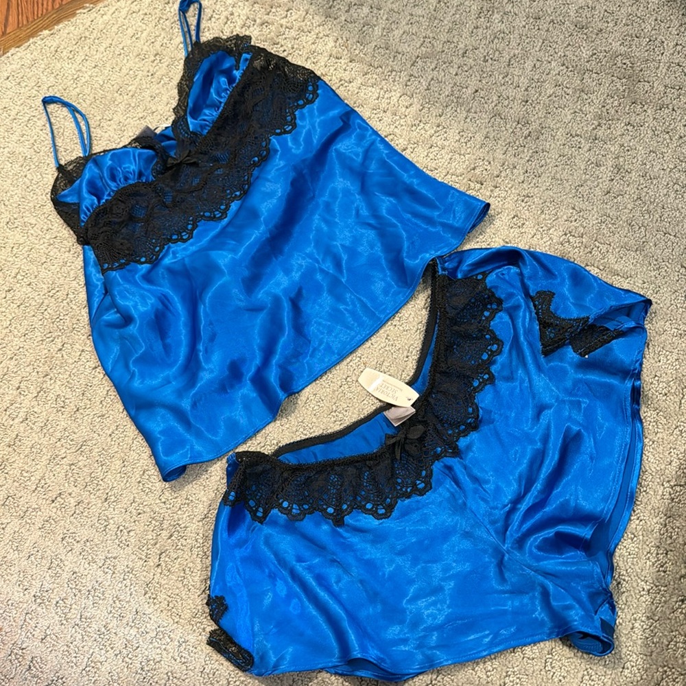 New Victoria’s Secret set; blue with black lace. Size small.